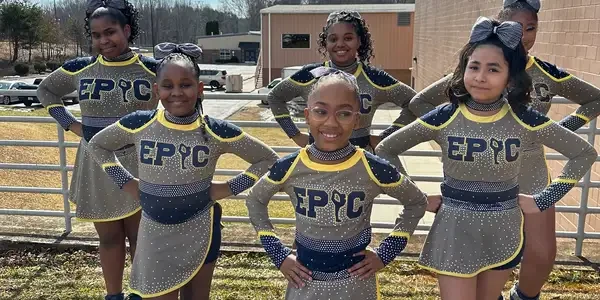 EPIC cheer team members in competition uniforms